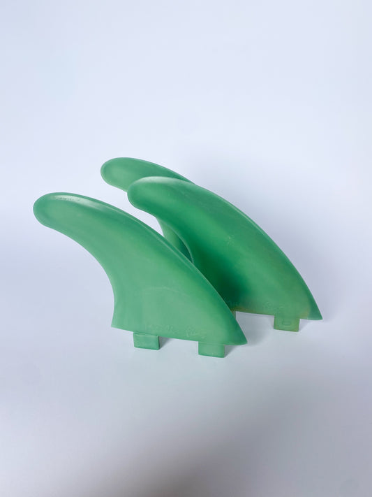 FCS thruster surf fin set made from recycled plastic.