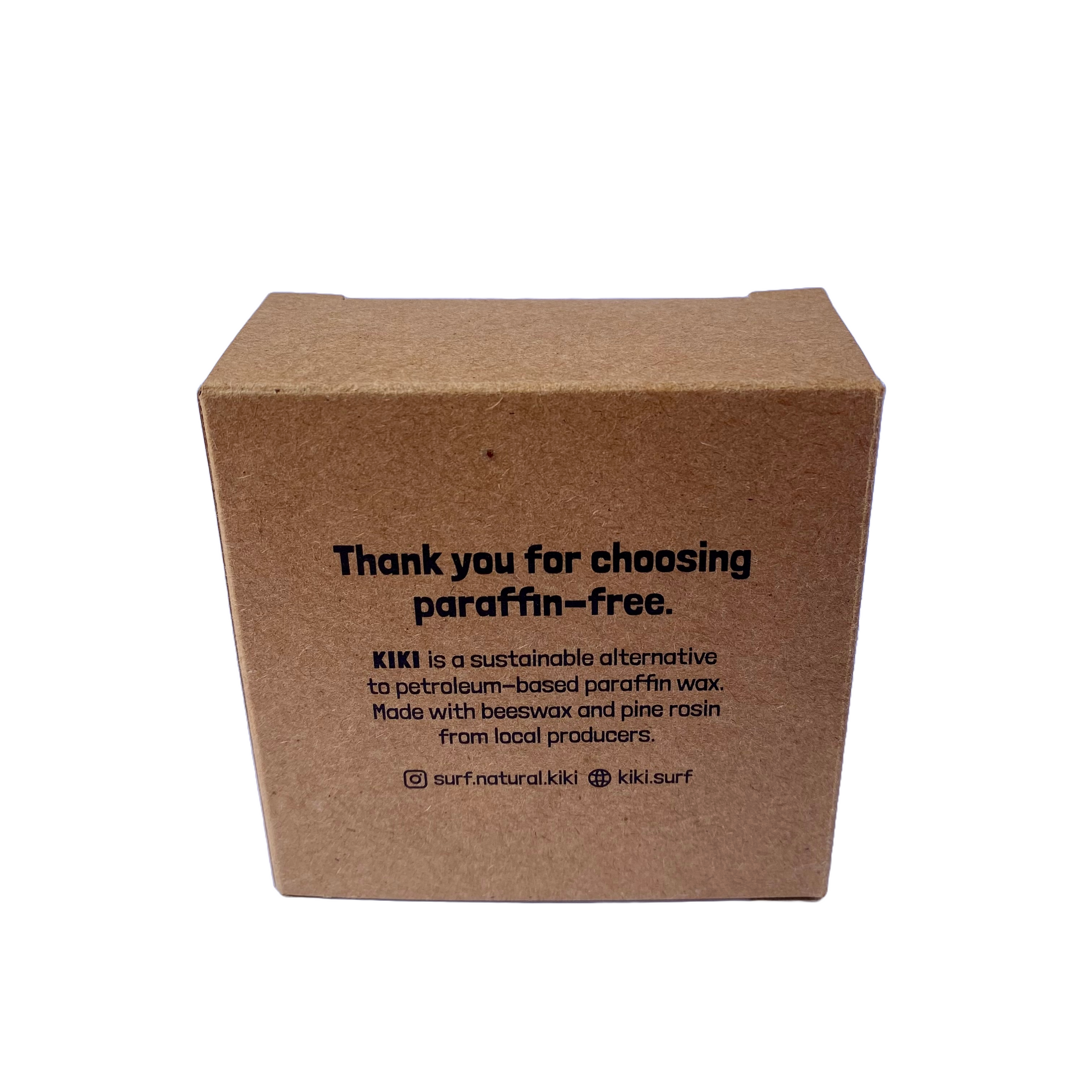 Image of a box of natural reef safe surf wax. The writing on the box reads "KIKI is a sustainable alternative to petroleum-based paraffin wax. Made with beeswax and pine rosin from local producers". 