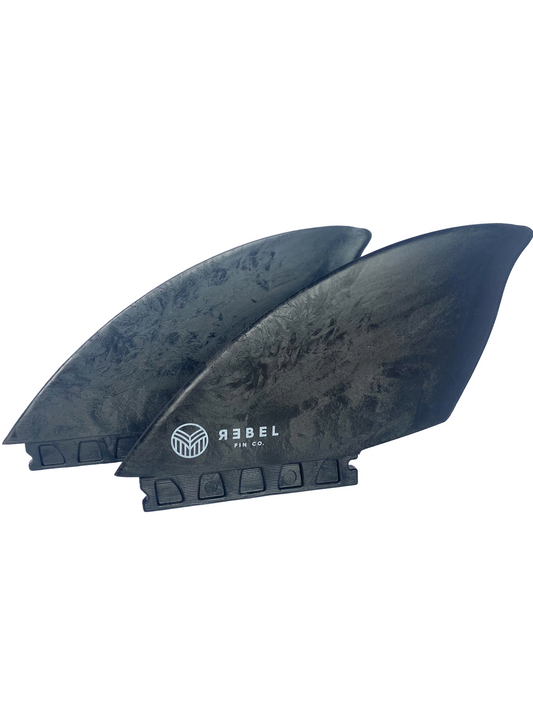 A set of black twin fins for surfboards. Made from recycled materials with future fittings.